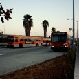 Here: Just passing through Nearly every weekday morning, I wait in a transit mall in LA County. The wait lasts about 20 minutes, offering time to finish my morning coffee and, beginning today, write...